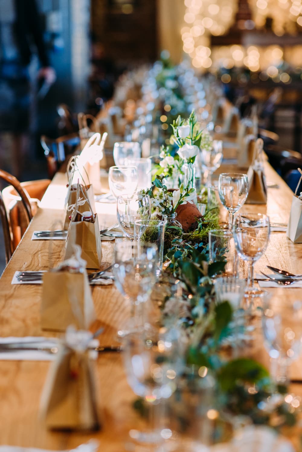 table decor with moss and leaves at a wedding at east quay venue in kent