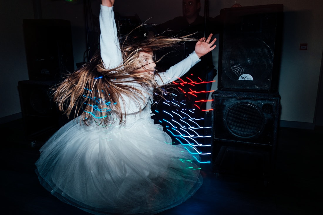 flower girl on the dancefloor at a wedding
