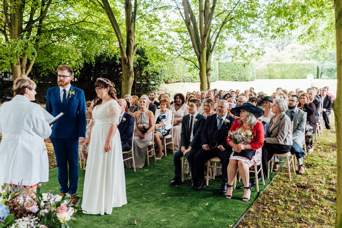 outdoor wedding ceremony back garden and tipi