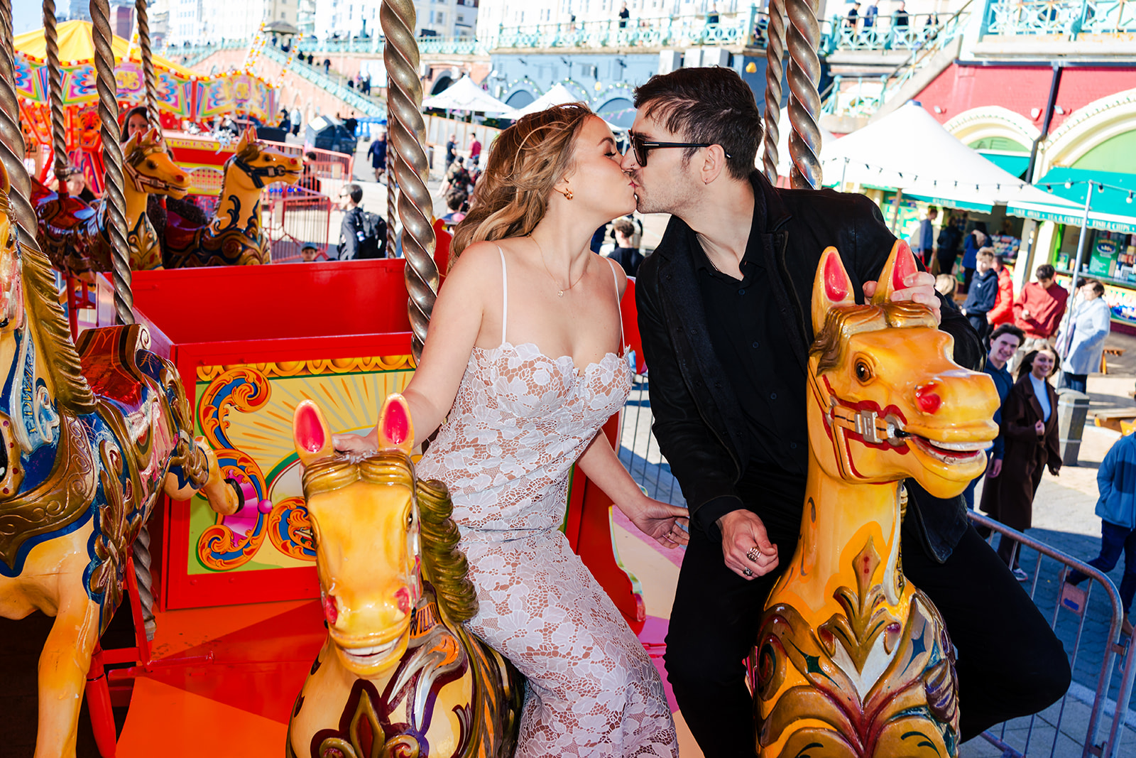 Joe and Amanda on the carousel on Brighton Palace Pier