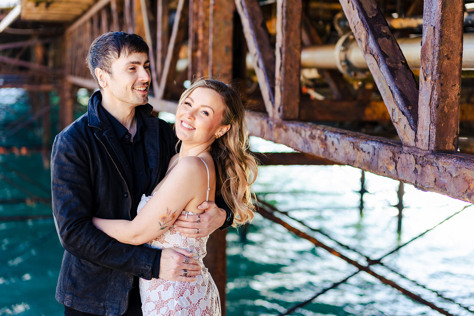 Joe and Amanda under the pier