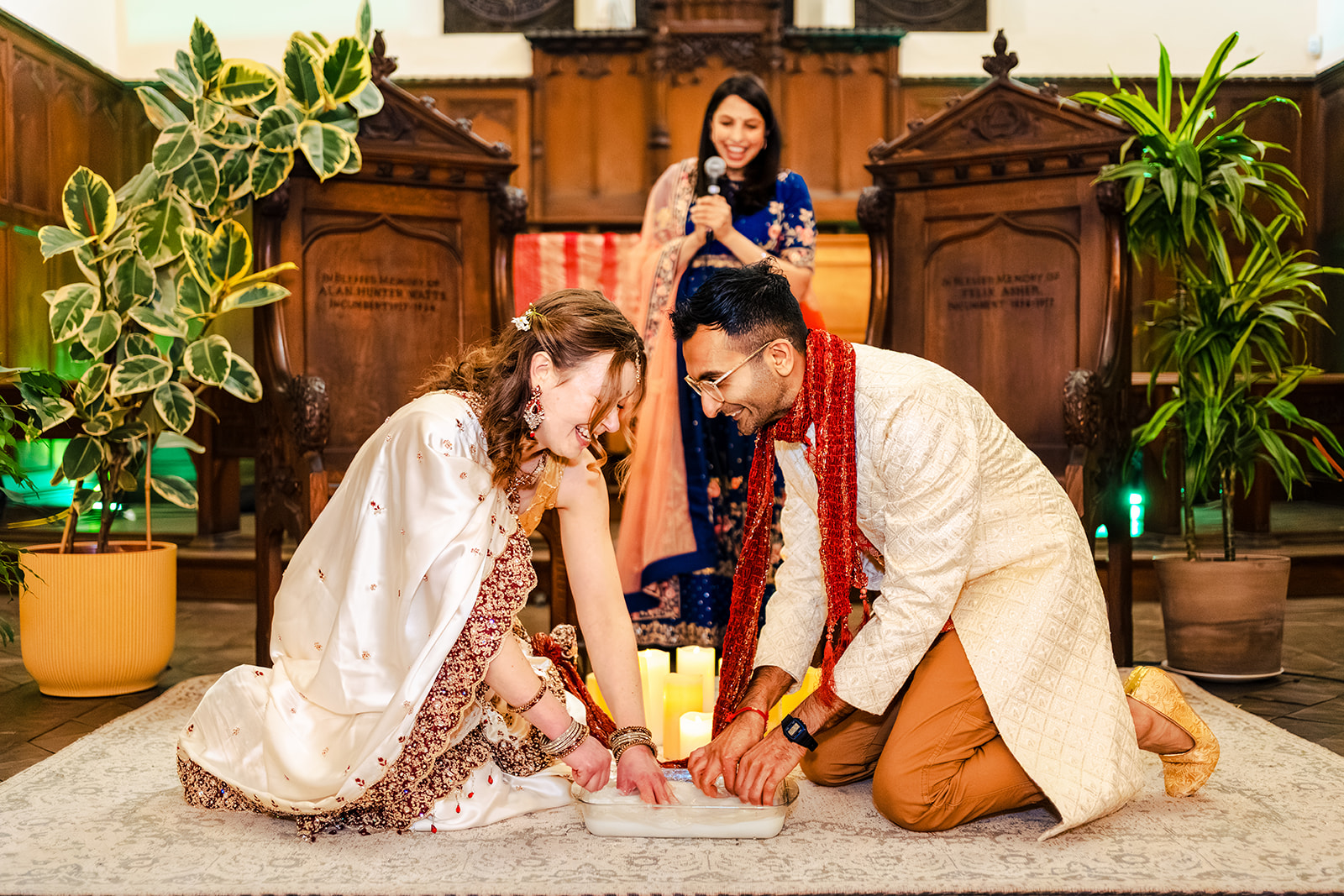 Cat and Chetan at the front of the hall