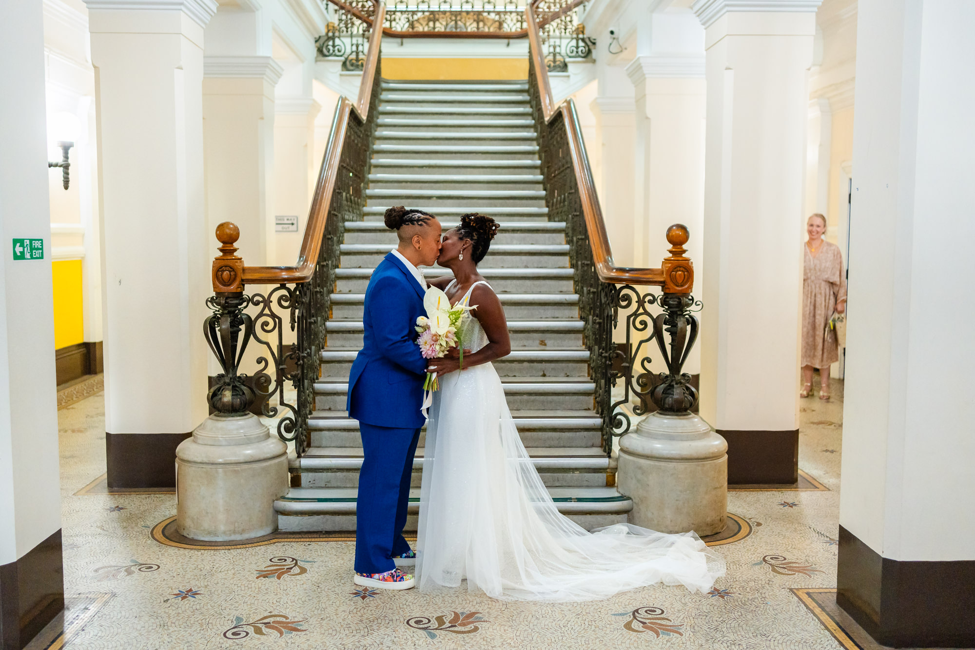Azieb and Jules on the staircase at Brighton Town Hall