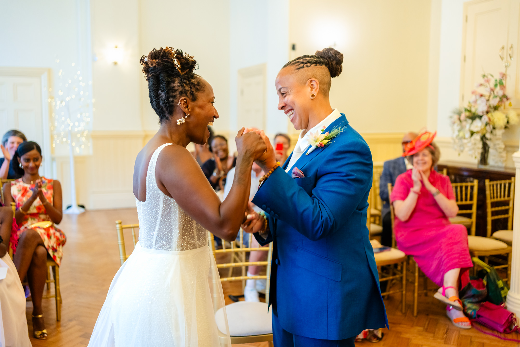 Azieb and Jules celebrating after their ceremony