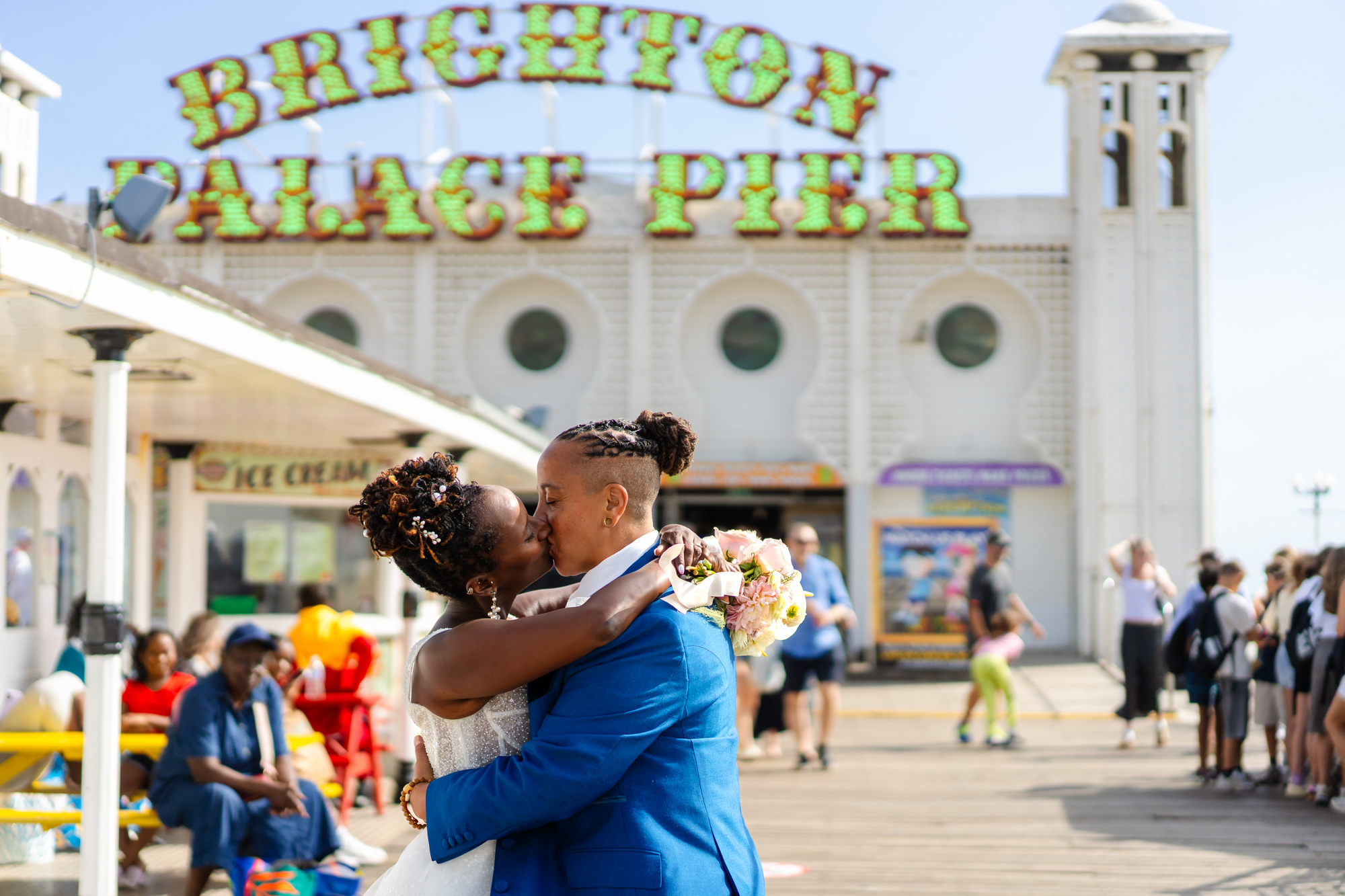 Azieb and Jules in front of Brighton Palace Pier