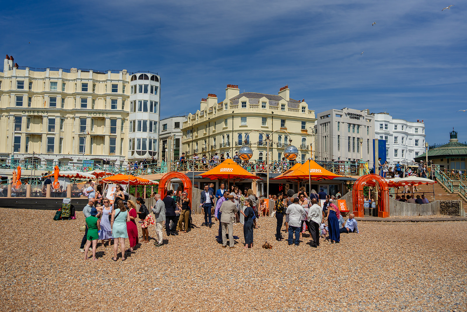 The whole wedding party on Brighton beach