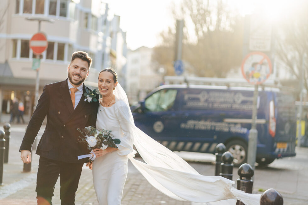 Sophie and Ed in golden winter light on a Brighton street